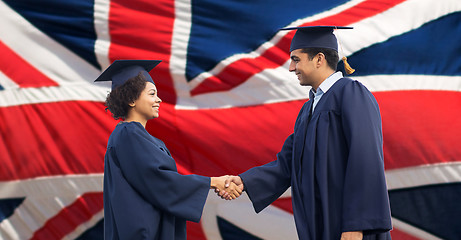 Image showing happy students or bachelors greeting each other