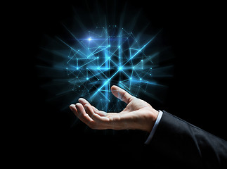 Image showing close up of businessman hand with hologram