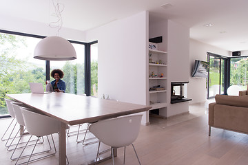 Image showing African American woman in the living room