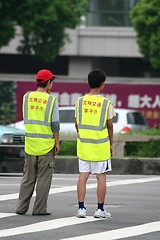 Image showing Helping pedestrians