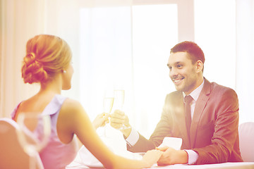 Image showing couple with glasses of champagne at restaurant