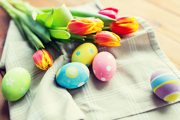 Image showing close up of colored easter eggs and flowers