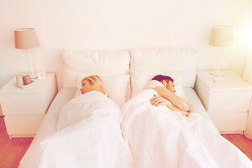 Image showing couple sleeping in bed at home