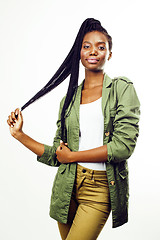 Image showing young pretty african-american girl posing cheerful emotional on white background isolated, lifestyle people concept