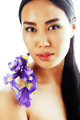 Image showing young pretty asian woman with flower orchid close up isolated sp