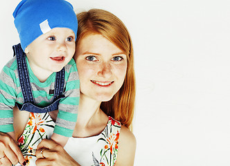 Image showing young beauty mother with cute baby, red head happy modern family