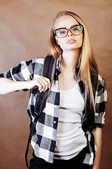 Image showing young happy smiling hipster blond girl with backpack ready to sc