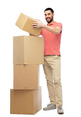 Image showing happy man with cardboard boxes