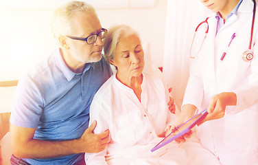 Image showing senior woman and doctor with tablet pc at hospital