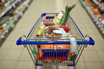 Image showing food in shopping cart or trolley at supermarket