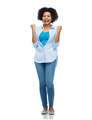 Image showing happy african american young woman over white