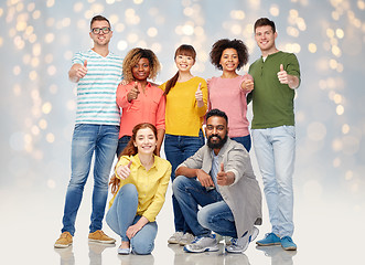 Image showing international group of people showing thumbs up