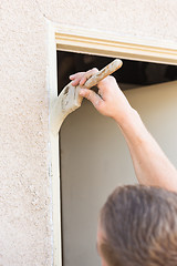 Image showing Professional Painter Cutting In With Brush to Paint House Door F