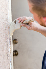 Image showing Professional Painter Cutting In With Brush to Paint House Door F