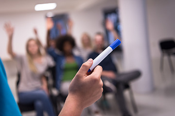 Image showing close up of teacher hand with marker