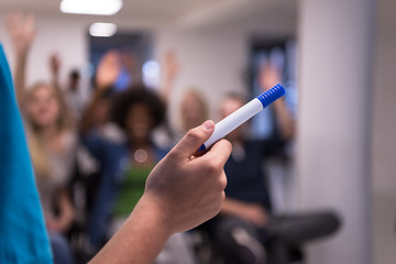 Image showing close up of teacher hand with marker