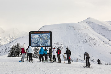 Image showing Skiers at the Top of the Slope