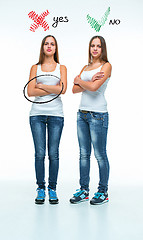 Image showing conceptual portrait of two beautiful twin young women