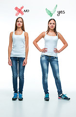 Image showing conceptual portrait of two beautiful twin young women