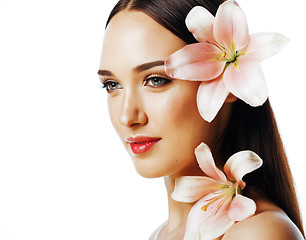 Image showing young attractive lady close up with hands on face isolated flowe