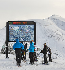 Image showing Skiers at the Top of the Slope