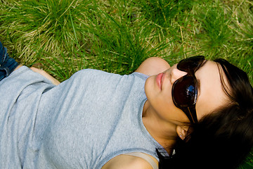 Image showing young girl on green grass