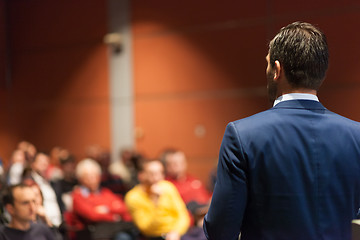 Image showing Public speaker giving talk at Business Event.