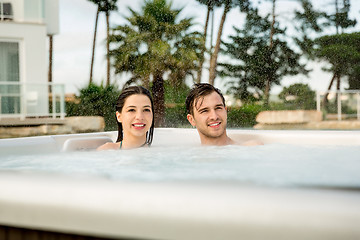 Image showing Young couple in a jacuzzi