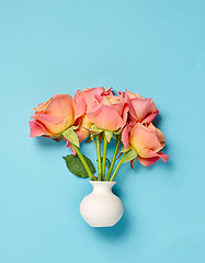 Image showing pink roses in white vase