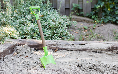 Image showing Little shovel in the sand