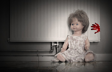 Image showing Concept of child abuse - Bloody doll