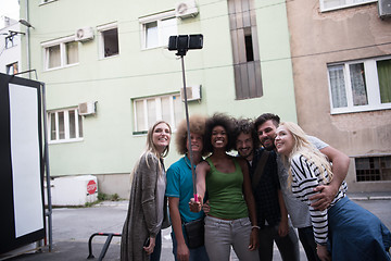 Image showing Group of friends taking picture of themselves