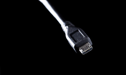 Image showing Usb cord on black background