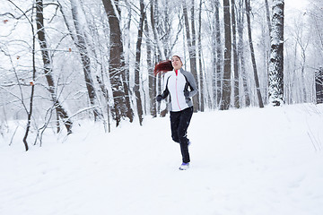 Image showing Young girl running on morning