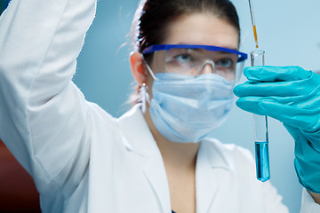 Image showing Laboratory technician with test tube