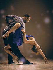 Image showing The man and the woman dancing argentinian tango