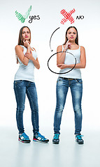 Image showing conceptual portrait of two beautiful twin young women