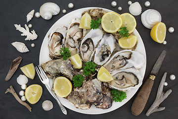 Image showing Oysters with Lemon and Parsley