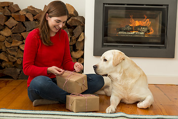 Image showing Wrapping presents for Christmas