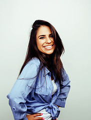 Image showing young happy smiling latin american teenage girl emotional posing on white background, lifestyle people concept 