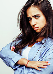 Image showing young happy smiling latin american teenage girl emotional posing on white background, lifestyle people concept 