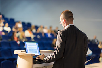 Image showing Public speaker giving talk at business event.