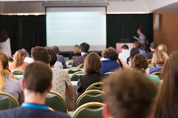 Image showing Audience in lecture hall participating at business conference.