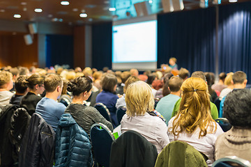 Image showing Audience in lecture hall participating at business event.