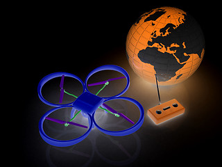 Image showing Quadrocopter Drone with Earth Globe and remote controller on a w