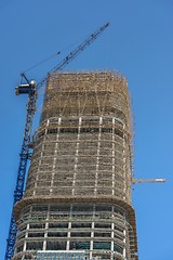 Image showing Construction of skyscrapers under blue sky