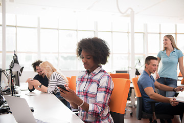 Image showing African American informal business woman working in the office