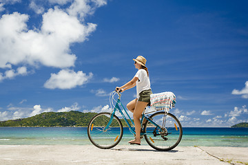 Image showing Woman ride along The Beach