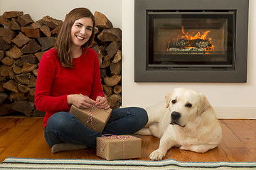 Image showing Wrapping presents for Christmas