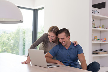 Image showing couple using laptop at home